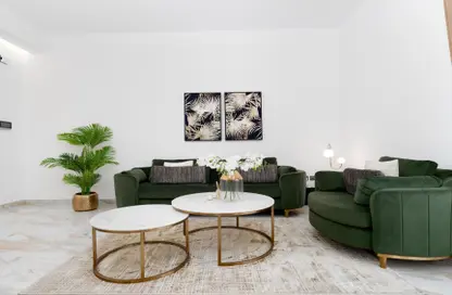 Living Room image for: Apartment - 2 Bedrooms - 3 Bathrooms for sale in Barari Hills Residence - Majan - Dubai, Image 1