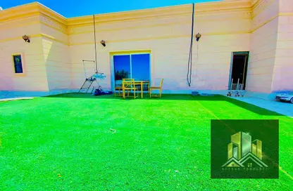 Garden image for: Apartment - 3 Bedrooms - 2 Bathrooms for rent in Villa Compound - Khalifa City - Abu Dhabi, Image 1