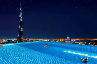 صورة لـ حوض سباحة شقة - غرفة نوم - 2 حمامات للبيع في بيز من دانوب - الخليج التجاري - دبي ، صورة رقم 1