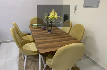Dining Room image for: Apartment - 1 Bedroom - 2 Bathrooms for sale in Emirates City - Ajman, Image 1