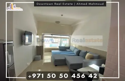 Living / Dining Room image for: Apartment - 1 Bathroom for sale in Tower B3 - Ajman Pearl Towers - Ajman Downtown - Ajman, Image 1