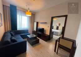 Living Room image for: Apartment - 1 bedroom - 2 bathrooms for rent in Al Mamoura - Muroor Area - Abu Dhabi, Image 1
