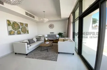 Living Room image for: Villa - 3 Bedrooms - 5 Bathrooms for rent in Aknan Villas - Amazonia - Damac Hills 2 - Dubai, Image 1