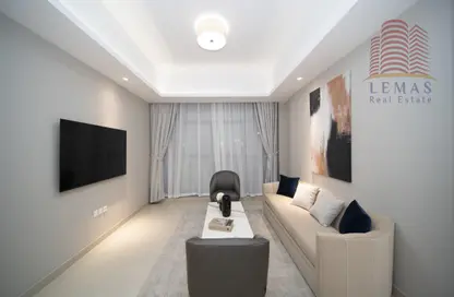 Living Room image for: Apartment - 1 Bedroom - 1 Bathroom for sale in Ajman Creek Towers - Al Rashidiya 1 - Al Rashidiya - Ajman, Image 1