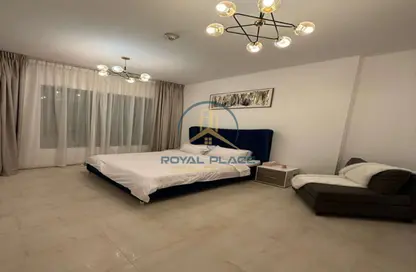 شقة - غرفة نوم - 2 حمامات للايجار في برج حمزة - مدينة دبي الرياضية - دبي