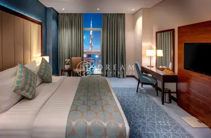 صورة لـ غرفة- غرفة النوم شقة - 2 غرف نوم - 3 حمامات للايجار في رويال كونتيننتال سويتس - الخليج التجاري - دبي ، صورة رقم 1