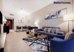 صورةغرفة المعيشة / غرفة الطعام لـ: شقة - 1 غرفة نوم - 1 حمام للكراء في فندق تو سيزنز للشقق فندقية - مدينة دبي الإعلامية - دبي, صورة 1