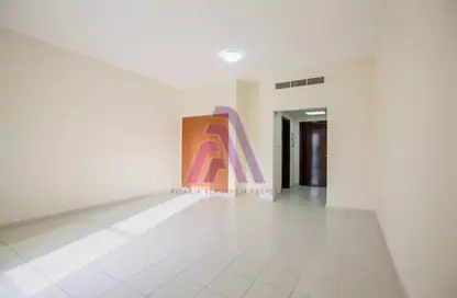 Empty Room image for: Apartment - 1 Bathroom for rent in Z02 - England Cluster - International City - Dubai, Image 1