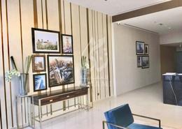Living Room image for: Studio - 1 bathroom for sale in Golf Panorama A - Golf Panorama - DAMAC Hills - Dubai, Image 1