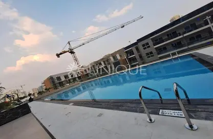 Pool image for: Apartment - 1 Bedroom - 2 Bathrooms for sale in Binghatti Crest - Jumeirah Village Circle - Dubai, Image 1