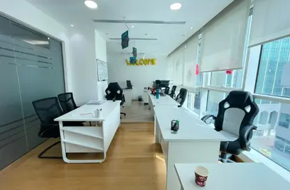 Business Centre - Studio - 4 Bathrooms for rent in Hanging Garden Tower - Al Danah - Abu Dhabi