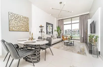 Living / Dining Room image for: Apartment - 1 Bedroom - 2 Bathrooms for sale in Prime Views by Prescott - Meydan Avenue - Meydan - Dubai, Image 1