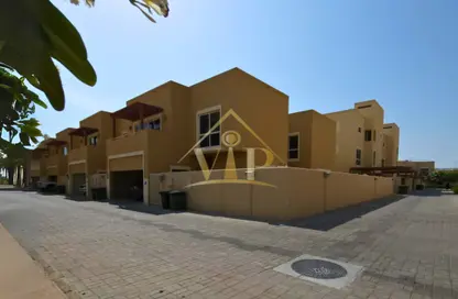 Outdoor Building image for: Townhouse - 4 Bedrooms - 5 Bathrooms for sale in Khannour Community - Al Raha Gardens - Abu Dhabi, Image 1