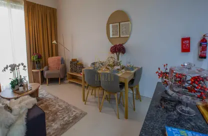 Living / Dining Room image for: Apartment - 1 Bedroom - 2 Bathrooms for sale in Montrell - Al Furjan - Dubai, Image 1
