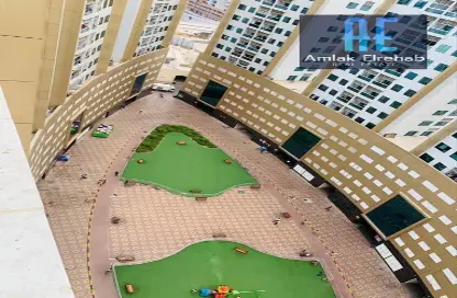 Outdoor Building image for: Apartment - 3 Bedrooms - 4 Bathrooms for rent in Ajman Pearl Towers - Ajman Downtown - Ajman, Image 1