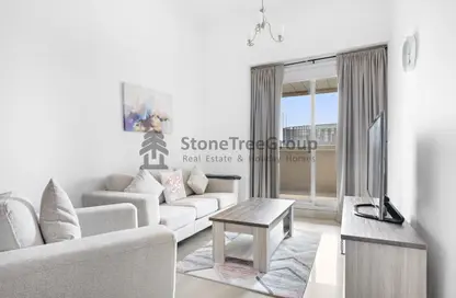 Living Room image for: Apartment - 1 Bedroom - 1 Bathroom for rent in Dream Towers - Dubai Marina - Dubai, Image 1