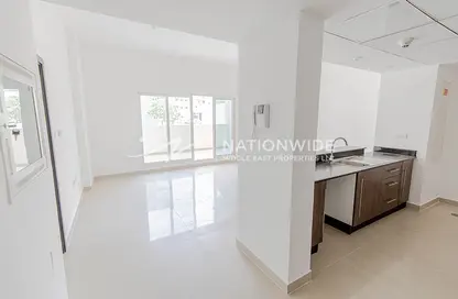 Kitchen image for: Apartment - 1 Bedroom - 2 Bathrooms for sale in Tower 34 - Al Reef Downtown - Al Reef - Abu Dhabi, Image 1