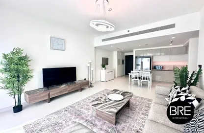Living / Dining Room image for: Apartment - 2 Bedrooms - 2 Bathrooms for rent in Marina Vista - EMAAR Beachfront - Dubai Harbour - Dubai, Image 1