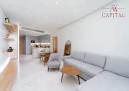 Living Room image for: Apartment - 2 bedrooms - 2 bathrooms for rent in FIVE at Jumeirah Village Circle - Jumeirah Village Circle - Dubai, Image 1