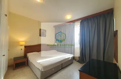 صورة لـ غرفة- غرفة النوم شقة - غرفة نوم - 2 حمامات للايجار في شارع الفلاح - وسط المدينة - أبوظبي ، صورة رقم 1