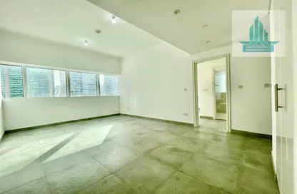 Bulk Rent Unit - Studio - 2 Bathrooms for rent in Al Ramhan Tower - Tourist Club Area - Abu Dhabi
