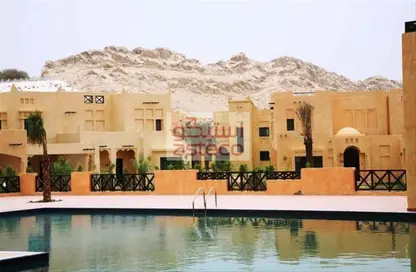 Villa - 3 Bedrooms - 3 Bathrooms for rent in Al Oyoun Village - Al Ain