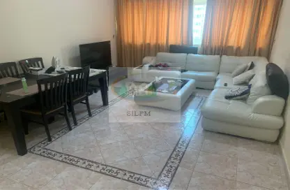 Living / Dining Room image for: Apartment - 1 Bedroom - 2 Bathrooms for rent in Tourist Club Area - Abu Dhabi, Image 1