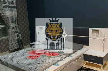 شقة - غرفة نوم - 2 حمامات للايجار في أورينت تاور 1 - أورينت تاور - البستان - عجمان