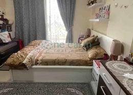 صورةغرفة- غرفة النوم لـ: شقة - 1 غرفة نوم - 2 حمامات للبيع في صبحة دافوديل - قرية الجميرا سركل - دبي, صورة 1