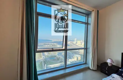 شقة - غرفة نوم - 2 حمامات للايجار في أورينت تاور 2 - أورينت تاور - البستان - عجمان