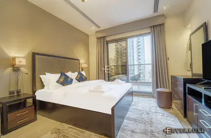 Room / Bedroom image for: Apartment - 1 Bathroom for rent in Elite Downtown Residence - Downtown Dubai - Dubai, Image 1
