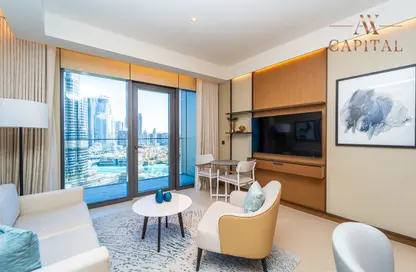 Living Room image for: Apartment - 2 Bedrooms - 3 Bathrooms for sale in The Address Residences Dubai Opera Tower 2 - The Address Residences Dubai Opera - Downtown Dubai - Dubai, Image 1
