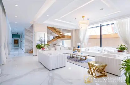 Living / Dining Room image for: Villa - 4 Bedrooms - 5 Bathrooms for sale in La Mer South Island - La Mer - Jumeirah - Dubai, Image 1