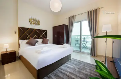صورة لـ غرفة- غرفة النوم شقة - 1 حمام للايجار في المساكن الحمراء - مدينة دبي الرياضية - دبي ، صورة رقم 1