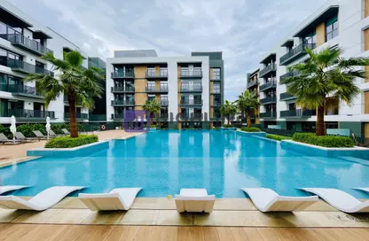 Pool image for: Apartment - 2 Bedrooms - 3 Bathrooms for sale in Belgravia Square - Jumeirah Village Circle - Dubai, Image 1
