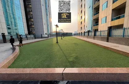 Apartment - 2 Bedrooms - 2 Bathrooms for sale in Orient Tower 1 - Orient Towers - Al Bustan - Ajman