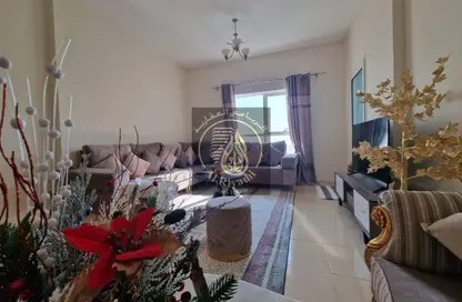 شقة - غرفة نوم - 2 حمامات للايجار في أورينت تاور 1 - أورينت تاور - البستان - عجمان