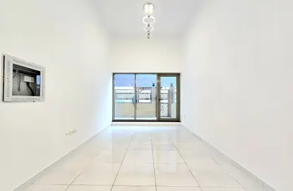 Apartment - 1 Bedroom - 2 Bathrooms for rent in Ajyad Building - Jumeirah Village Circle - Dubai