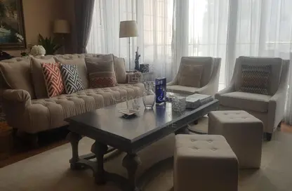 Living Room image for: Apartment - 2 Bedrooms - 3 Bathrooms for rent in Burj Daman - DIFC - Dubai, Image 1