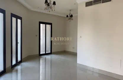 Empty Room image for: Apartment - 2 Bedrooms - 3 Bathrooms for sale in Le Grand Chateau A - Le Grand Chateau - Jumeirah Village Circle - Dubai, Image 1