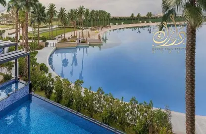 Pool image for: Townhouse - 2 Bedrooms - 3 Bathrooms for sale in Hayyan - Sharjah, Image 1