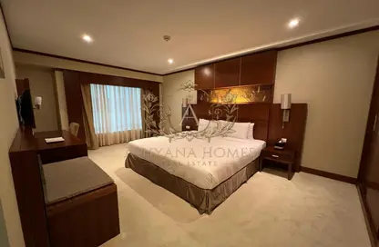 Room / Bedroom image for: Apartment - 2 Bedrooms - 2 Bathrooms for rent in The Carlton Downtown Hotel - Sheikh Zayed Road - Dubai, Image 1