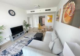 Living Room image for: Apartment - 1 bedroom - 1 bathroom for rent in Bloom Towers B - Bloom Towers - Jumeirah Village Circle - Dubai, Image 1