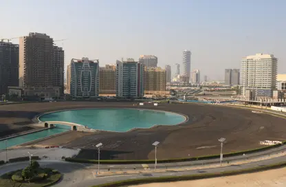 صورة لـ حوض سباحة شقة - 1 حمام للبيع في مساكن النخبة رقم 5 - مساكن النخبة الرياضية - مدينة دبي الرياضية - دبي ، صورة رقم 1