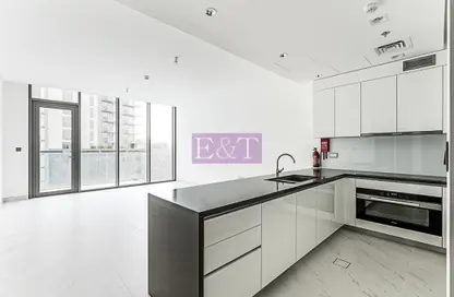 صورة لـ مطبخ شقة - 2 غرف نوم - 3 حمامات للايجار في مساكن 12 - المنطقة وان - مدينة الشيخ محمد بن راشد - دبي ، صورة رقم 1