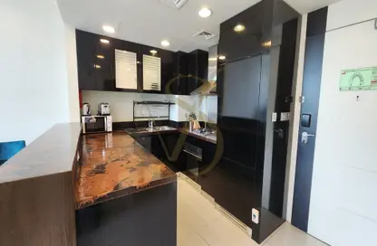 Kitchen image for: Apartment - 2 Bedrooms - 2 Bathrooms for rent in Bay's Edge - Business Bay - Dubai, Image 1