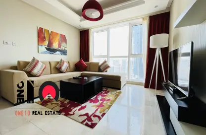 Living Room image for: Apartment - 1 Bedroom - 2 Bathrooms for rent in Corniche Road - Abu Dhabi, Image 1