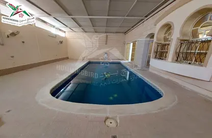 Pool image for: Villa - 4 Bedrooms - 5 Bathrooms for rent in Shaab Al Askar - Zakher - Al Ain, Image 1