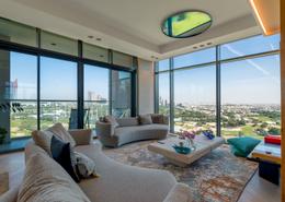 صورةغرفة المعيشة لـ: شقة - 3 غرف نوم - 5 حمامات للبيع في برج B1 - فندق فيدا - مشروع التلال - دبي, صورة 1
