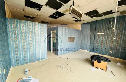 Empty Room image for: Shop - Studio - 1 Bathroom for rent in Greece Cluster - International City - Dubai, Image 1